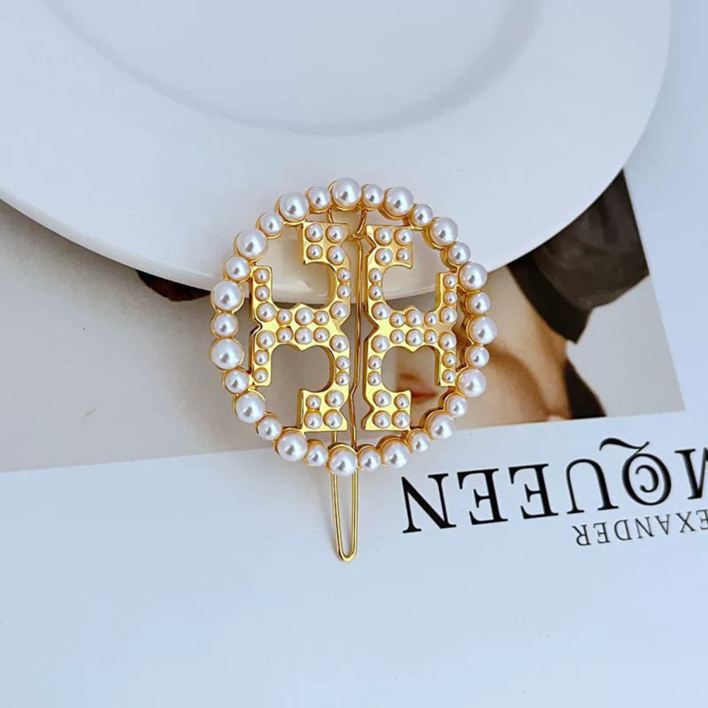 Tory Burch Seed Pearl Inlaid Round Cutout Letter Hair Clip